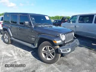 2021 Jeep Wrangler Unlimited Sahara z VIN 1C4HJXEN3MW525716, wystawiony jako IAAI lot #42974390 z przebiegiem 87 931 mil mil oraz . Historia ofert i sprzedaży dostępna na DreamBid. Obrazek 1.