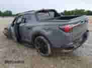 2023 Hyundai Santa Cruz Night Edition с VIN 5NTJCDAF8PH060564, выставлен на аукционе Copart как лот 61330885 с пробегом 45 026 миль миль и Списание • Salvage title. История ставок и продаж доступна на DreamBid. Изображение 2.