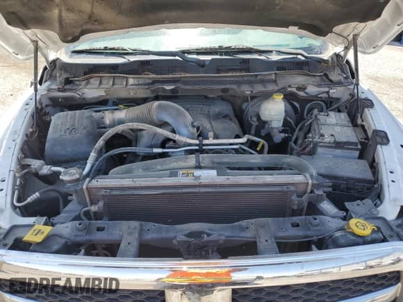 2016 Ram 1500 Tradesman z VIN 1C6RR7FT7GS142455, wystawiony jako Copart lot #63335105 z przebiegiem 122 161 mil mil oraz Szkoda całkowita • Salvage title. Historia ofert i sprzedaży dostępna na DreamBid. Obrazek 11.