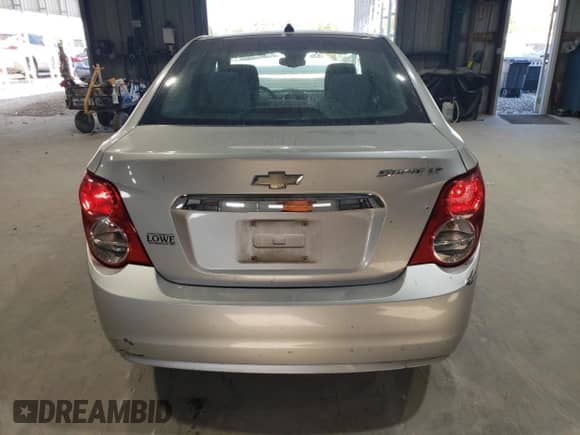 2012 Chevrolet Sonic LT с VIN 1G1JC5SH8C4105712, выставлен на аукционе Copart как лот 84606115 с пробегом 233 577 миль миль и Списание • Salvage title. История ставок и продаж доступна на DreamBid. Изображение 6.
