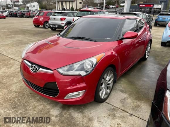 2015 Hyundai Veloster z VIN KMHTC6AD0FU238274, wystawiony jako Copart lot #45174464 z przebiegiem 143 112 mil mil oraz . Historia ofert i sprzedaży dostępna na DreamBid. Obrazek 2.