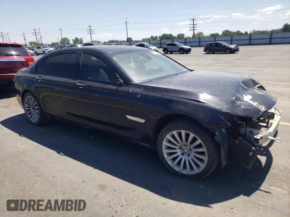 2013 BMW 7 Series 740Li xDrive with VIN WBAYF4C52DD127862, listed as a Copart auction lot 61093035 with 161,403 mi miles and Salvage title. Bid and sale history available at DreamBid. Image 4.
