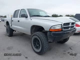 2004 Dodge Dakota Sport with VIN 1D7HG38NX4S608298, listed as a IAAI auction lot 41621473 with 192,876 mi miles and . Bid and sale history available at DreamBid. Image 1.