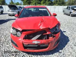 2014 Chevrolet Sonic LT z VIN 1G1JC5SH2E4110651, wystawiony jako Copart lot #86294375 z przebiegiem 108 368 mil mil oraz Szkoda całkowita • Salvage title. Historia ofert i sprzedaży dostępna na DreamBid. Obrazek 5.