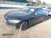 2014 BMW 4 Series 428i xDrive with VIN WBA3N9C55EF721295, listed as a IAAI auction lot 42139256 with 85,472 mi miles and . Bid and sale history available at DreamBid. Image 18.