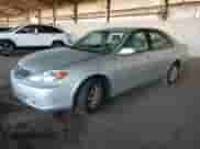 2003 Toyota Camry LE with VIN JTDBE32K330184641, listed as a Copart auction lot 86717825 with 110,616 mi miles and Salvage title. Bid and sale history available at DreamBid. Image 1.