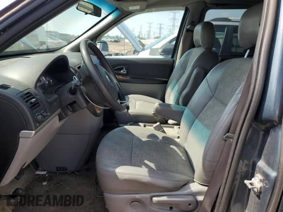 2006 Saturn Relay 2 FWD with VIN 5GZDV03L66D141096, listed as a Copart auction lot 64464345 with 198,698 mi miles and Salvage title. Bid and sale history available at DreamBid. Image 7.
