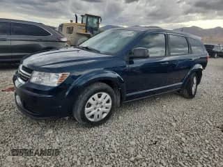2014 Dodge Journey American Value с VIN 3C4PDCAB8ET263156, выставлен на аукционе Copart как лот 85112605 с пробегом 105 219 миль миль и Списание • Salvage title. История ставок и продаж доступна на DreamBid. Изображение 1.