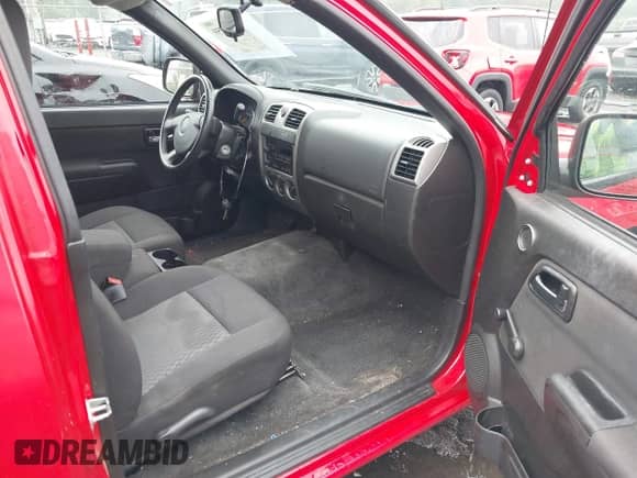 2012 Chevrolet Colorado Work Truck z VIN 1GCCSBF99C8127098, wystawiony jako IAAI lot #43303759 z przebiegiem 79 862 mil mil oraz . Historia ofert i sprzedaży dostępna na DreamBid. Obrazek 5.