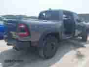 2021 Ram 1500 TRX with VIN 1C6SRFU99MN830292, listed as a IAAI auction lot 42449971 with 48,931 mi miles and . Bid and sale history available at DreamBid. Image 4.