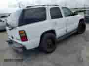 2004 Chevrolet Tahoe LS z VIN 1GNEC13V34R257463, wystawiony jako Copart lot #82425565 z przebiegiem 134 554 mil mil oraz Szkoda całkowita • Salvage title. Historia ofert i sprzedaży dostępna na DreamBid. Obrazek 3.