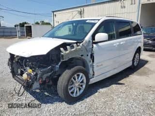 2016 Dodge Grand Caravan SXT with VIN 2C4RDGCG3GR396650, listed as a Copart auction lot 66267745 with 20,690 mi miles and Salvage title. Bid and sale history available at DreamBid. Image 1.