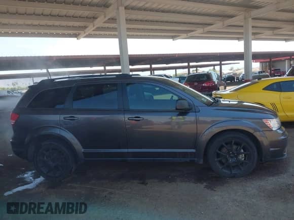 2020 Dodge Journey SE Value with VIN 3C4PDCAB9LT199657, listed as a IAAI auction lot 42821607 with 142,527 mi miles and . Bid and sale history available at DreamBid. Image 13.