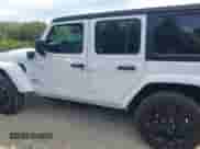 2023 Jeep Wrangler Sahara with VIN 1C4JJXP68PW696246, listed as a IAAI auction lot 43210023 with 41,232 mi miles and . Bid and sale history available at DreamBid. Image 14.