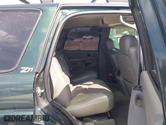 2004 Chevrolet Tahoe Z71 with VIN 1GNEK13ZX4R209898, listed as a IAAI auction lot 42980651 with 196,173 mi miles and . Bid and sale history available at DreamBid. Image 8.