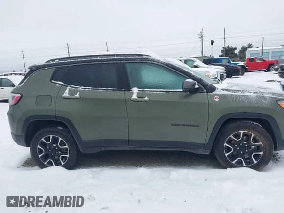 2021 Jeep Compass Trailhawk z VIN 3C4NJDDB7MT598103, wystawiony jako IAAI lot #41478590 z przebiegiem 95 036 mil mil oraz . Historia ofert i sprzedaży dostępna na DreamBid. Obrazek 13.