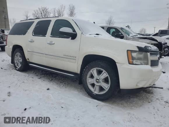 2010 Chevrolet Suburban LTZ with VIN 1GNUKKE3XAR226576, listed as a Copart auction lot 41474815 with 333,494 mi miles and Clean title. Bid and sale history available at DreamBid. Image 4.