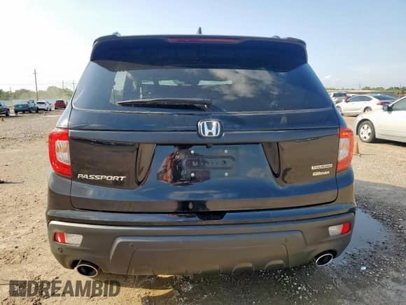 2021 Honda Passport Touring with VIN 5FNYF7H97MB014885, listed as a Copart auction lot 70517635 with 40,710 mi miles and Salvage title. Bid and sale history available at DreamBid. Image 6.