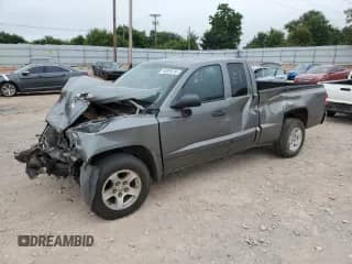 2006 Dodge Dakota SLT с VIN 1D7HE42K86S708932, выставлен на аукционе Copart как лот 66938765 с пробегом 243 244 миль миль и Списание • Salvage title. История ставок и продаж доступна на DreamBid. Изображение 1.