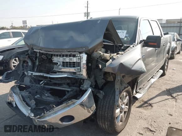 2013 Ford F-150 XL with VIN 1FTFW1CF8DKF41368, listed as a IAAI auction lot 43346570 with 240,666 mi miles and . Bid and sale history available at DreamBid. Image 2.