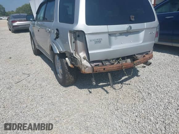 2008 Mercury Mariner with VIN 4M2CU91128KJ12970, listed as a IAAI auction lot 42940612 with 201,682 mi miles and . Bid and sale history available at DreamBid. Image 6.