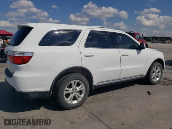 2013 Dodge Durango Special Service z VIN 1C4RDJFG7DC660210, wystawiony jako Copart lot #69582474 z przebiegiem 166 441 mil mil oraz Czysty tytuł • Clean title. Historia ofert i sprzedaży dostępna na DreamBid. Obrazek 3.