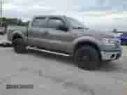 2014 Ford F-150 XLT with VIN 1FTFW1EF2EKD03028, listed as a Copart auction lot 83790445 with 174,756 mi miles and Salvage title. Bid and sale history available at DreamBid. Image 4.