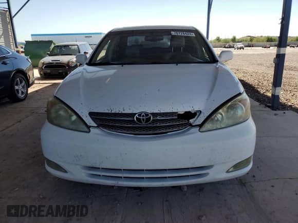 2003 Toyota Camry LE with VIN 4T1BF30K13U057424, listed as a Copart auction lot 76728424 with 198,456 mi miles and Clean title. Bid and sale history available at DreamBid. Image 5.