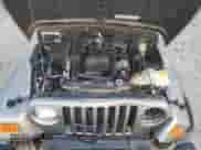 2005 Jeep Wrangler SE z VIN 1J4FA29105P344743, wystawiony jako Copart lot #75524944 z przebiegiem 108 824 mil mil oraz Szkoda całkowita • Salvage title. Historia ofert i sprzedaży dostępna na DreamBid. Obrazek 13.