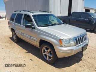 2004 Jeep Grand Cherokee with VIN 1J4GX58J64C167482, listed as a IAAI auction lot 42692534 with 149,819 mi miles and . Bid and sale history available at DreamBid. Image 1.