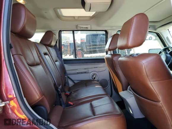 2007 Jeep Commander Limited with VIN 1J8HG58257C610852, listed as a Copart auction lot 49461225 with 91,125 mi miles and Salvage title. Bid and sale history available at DreamBid. Image 11.