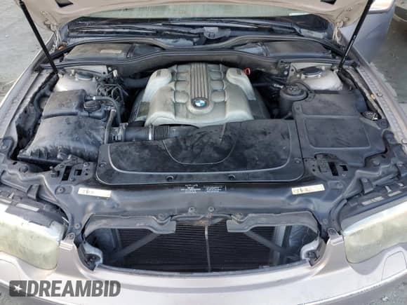 2004 BMW 7 Series 745Li with VIN WBAGN63404DS45720, listed as a Copart auction lot 82421485 with 173,177 mi miles and Salvage title. Bid and sale history available at DreamBid. Image 11.