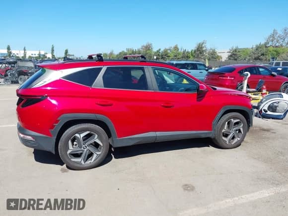 2022 Hyundai Tucson SEL z VIN 5NMJCCAE2NH095465, wystawiony jako IAAI lot #43341709 z przebiegiem 54 550 mil mil oraz . Historia ofert i sprzedaży dostępna na DreamBid. Obrazek 14.