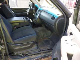 2007 Chevrolet Tahoe Police z VIN 1GNEC03097R417705, wystawiony jako IAAI lot #41882598 z przebiegiem 235 859 mil mil oraz . Historia ofert i sprzedaży dostępna na DreamBid. Obrazek 5.