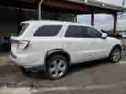 2014 Dodge Durango Limited with VIN 1C4SDJDT0EC438725, listed as a Copart auction lot 64326865 with 101,685 mi miles and Salvage title. Bid and sale history available at DreamBid. Image 3.