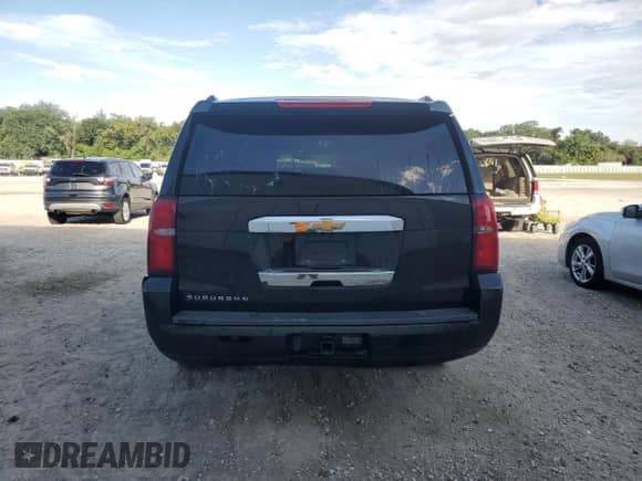 2019 Chevrolet Suburban LS with VIN 1GNSCGKCXKR341184, listed as a Copart auction lot 68689884 with 244,422 mi miles and Clean title. Bid and sale history available at DreamBid. Image 6.