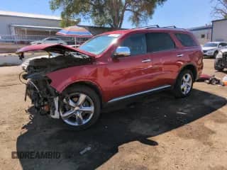 2011 Dodge Durango Citadel with VIN 1D4SE5GT5BC695099, listed as a Copart auction lot 68176855 with 220,540 mi miles and Salvage title. Bid and sale history available at DreamBid. Image 1.