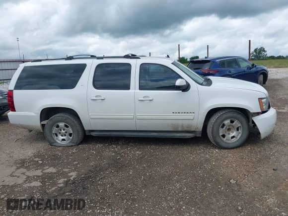 2013 Chevrolet Suburban LT с VIN 1GNSCJE05DR309857, выставлен на аукционе IAAI как лот 42217368 с пробегом 284 940 миль миль и . История ставок и продаж доступна на DreamBid. Изображение 13.