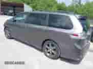 2015 Toyota Sienna SE with VIN 5TDXK3DC9FS598741, listed as a IAAI auction lot 42351368 with 150,054 mi miles and . Bid and sale history available at DreamBid. Image 3.