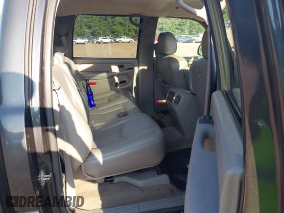 2005 Chevrolet Silverado 1500 LS with VIN 2GCEK13T551106726, listed as a IAAI auction lot 42658787 with Not provided miles and . Bid and sale history available at DreamBid. Image 8.