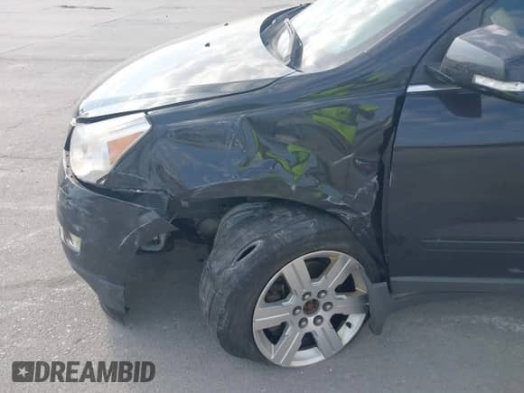 2011 Chevrolet Traverse 2LT z VIN 1GNKVJED7BJ409418, wystawiony jako IAAI lot #43325324 z przebiegiem 226 533 mil mil oraz . Historia ofert i sprzedaży dostępna na DreamBid. Obrazek 6.