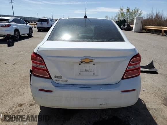 2018 Chevrolet Sonic LS with VIN 1G1JB5SH5J4104808, listed as a Copart auction lot 54892665 with 53,746 mi miles and Salvage title. Bid and sale history available at DreamBid. Image 6.