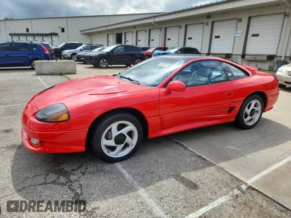 1992 Dodge Stealth z VIN JB3XE74C3NY028981, wystawiony jako Copart lot #61539105 z przebiegiem 40 774 mil mil oraz Szkoda całkowita • Salvage title. Historia ofert i sprzedaży dostępna na DreamBid. Obrazek 1.