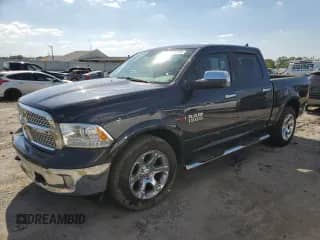 2014 Ram 1500 Laramie z VIN 1C6RR7NM7ES409777, wystawiony jako Copart lot #84391145 z przebiegiem 129 857 mil mil oraz Czysty tytuł • Clean title. Historia ofert i sprzedaży dostępna na DreamBid. Obrazek 1.