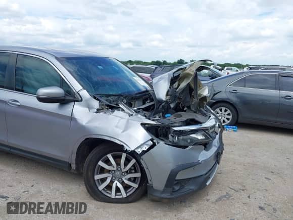 2020 Honda Pilot EX-L with VIN 5FNYF5H53LB015922, listed as a IAAI auction lot 42653933 with 72,897 mi miles and . Bid and sale history available at DreamBid. Image 6.