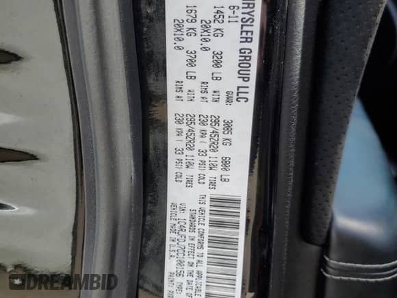 2012 Jeep Grand Cherokee SRT-8 z VIN 1C4RJFDJ7CC100156, wystawiony jako Copart lot #79865954 z przebiegiem 113 782 mil mil oraz Szkoda całkowita • Salvage title. Historia ofert i sprzedaży dostępna na DreamBid. Obrazek 13.