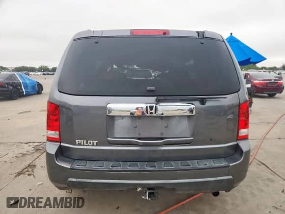 2011 Honda Pilot LX с VIN 5FNYF3H25BB056948, выставлен на аукционе Copart как лот 70953105 с пробегом 173 577 миль миль и Списание • Salvage title. История ставок и продаж доступна на DreamBid. Изображение 6.