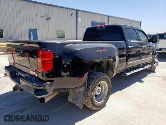 2018 Chevrolet Silverado 3500HD High Country with VIN 1GC4K1EY5JF182907, listed as a Copart auction lot 50472605 with 141,204 mi miles and Salvage title. Bid and sale history available at DreamBid. Image 4.