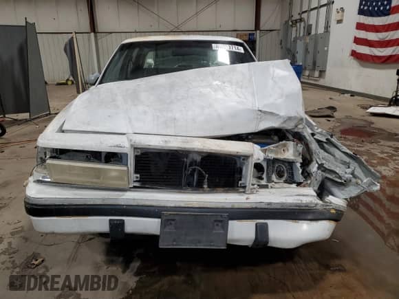 1992 Dodge Dynasty LE with VIN 1B3XC56RXND822802, listed as a Copart auction lot 82799714 with 137,131 mi miles and Salvage title. Bid and sale history available at DreamBid. Image 5.