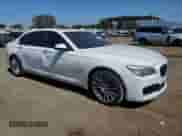 2015 BMW 7 Series with VIN WBAYG6C59FD383685, listed as a Copart auction lot 72630224 with 157,780 mi miles and Salvage title. Bid and sale history available at DreamBid. Image 4.